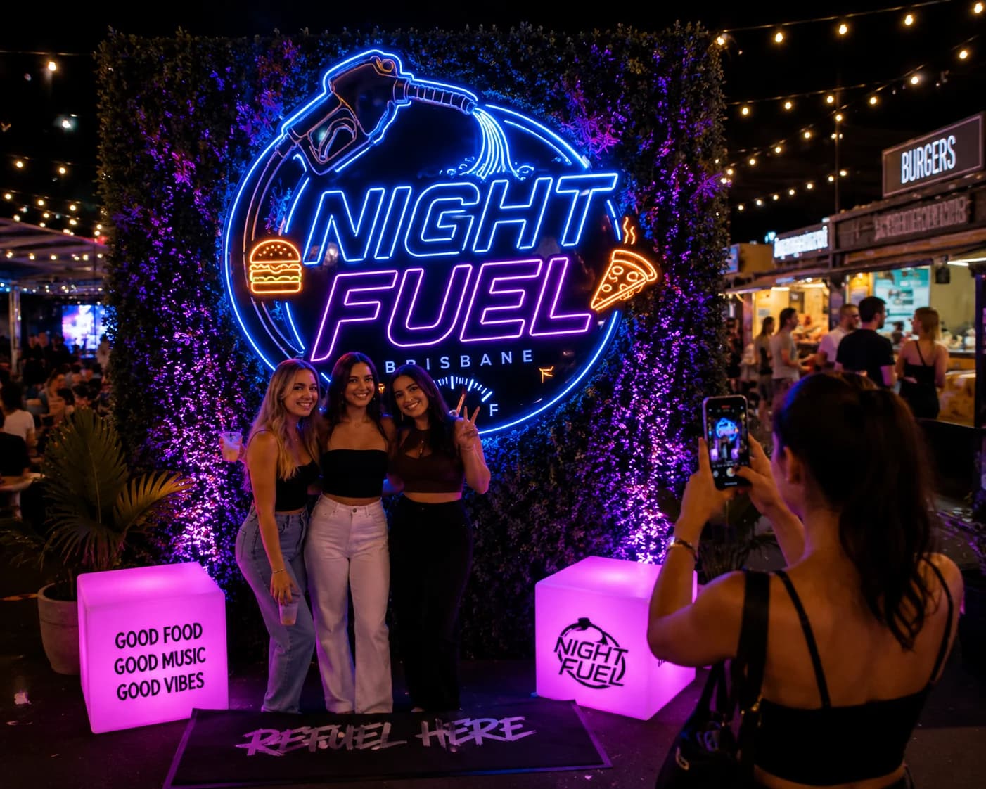 Night Fuel branded photo wall and illuminated installation concept